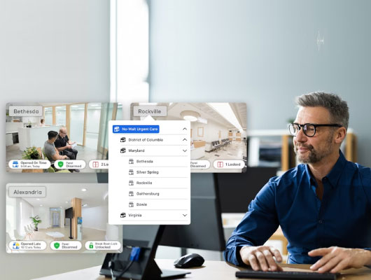 man monitoring his office through his tablet