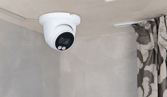 A diamond 4MP color turret camera installed on the ceiling